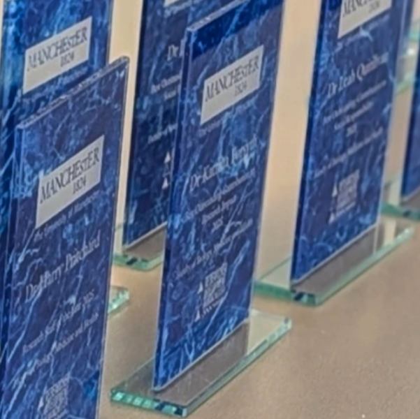 Row of The University of Manchester award trophies