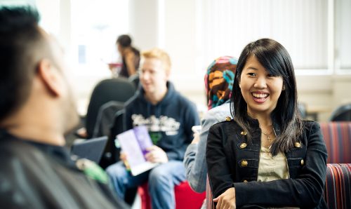 Criminology students laughing and talking 