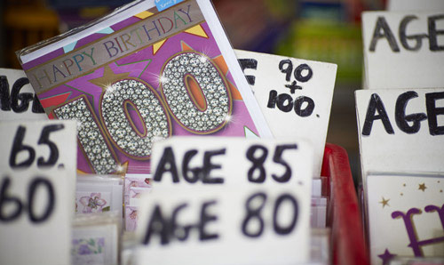 cards at a market stall